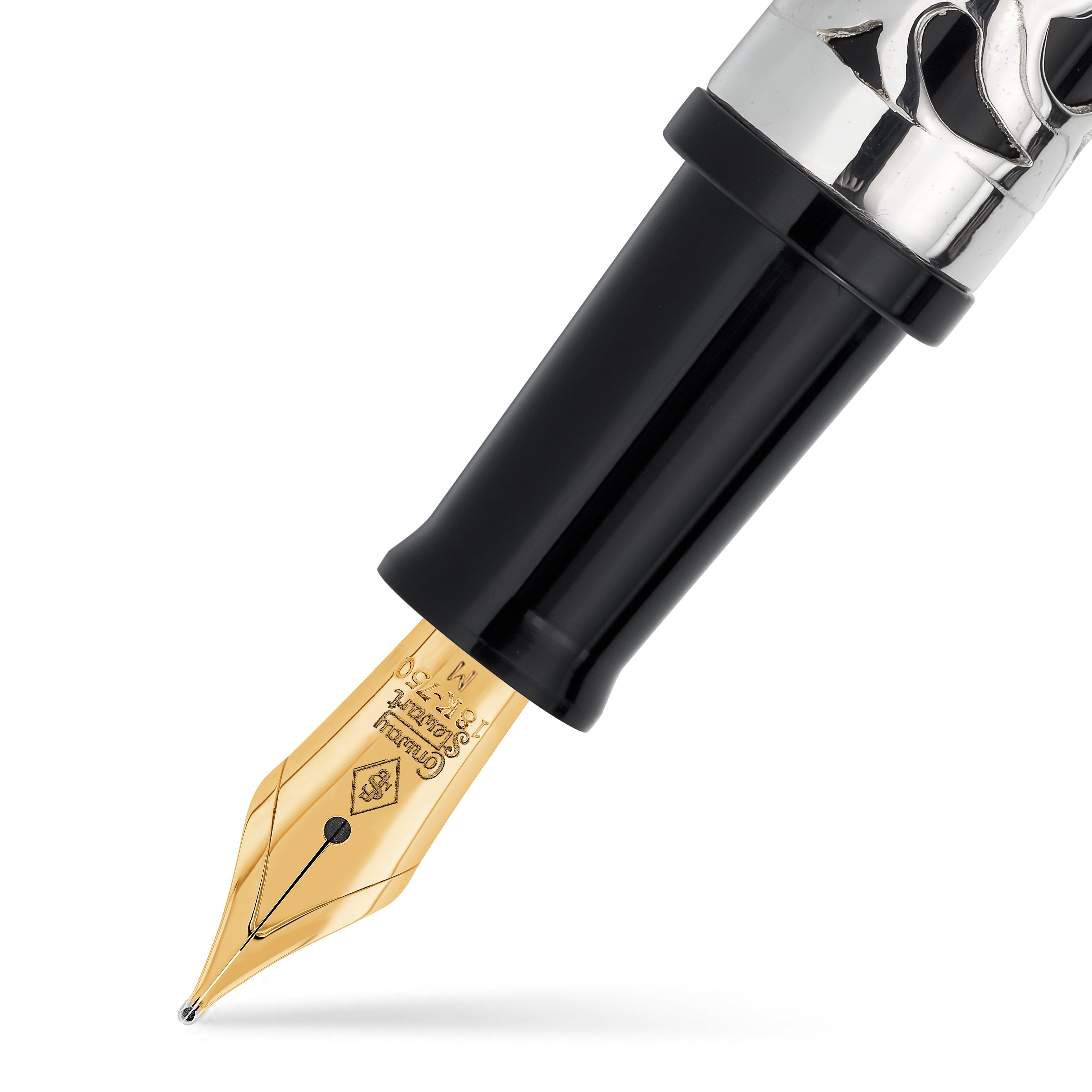 Close-up of the gold nib engraved with the Conway Stewart crest, black grip section above